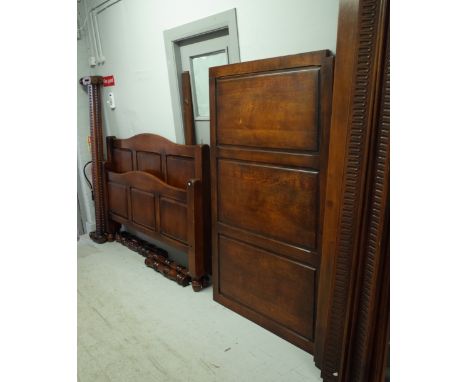 Harrods by The Royal Oak Furniture Company;  a 17th century style oak four poster bed with panel canopy, head and footboard a