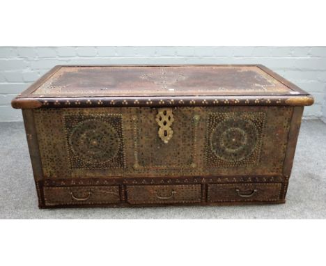 A 19th century brass bound and moulded teak Zanzibar trunk, the lift top over three drawers, 103cm wide x 46cm high. 