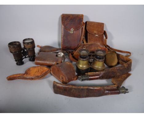 A group of collectables including binoculars, a gilt metal folding photo frame, powder flask and sundry, (qty). 