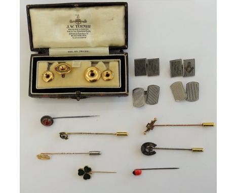 A set of four dress studs detailed 9ct, weight 3.3 gms, cased, a pair of cufflinks with engine turned decoration detailed sil