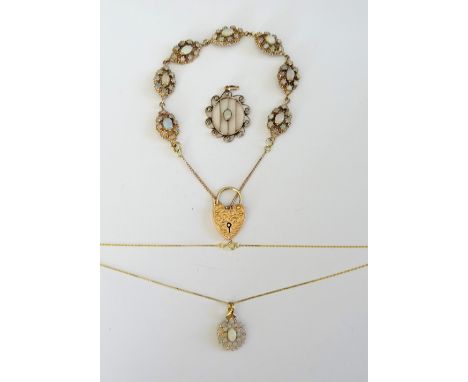 A gold and opal set cluster link bracelet, on an associated gold heart shaped padlock clasp, detailed 9 C, a gold, opal and s