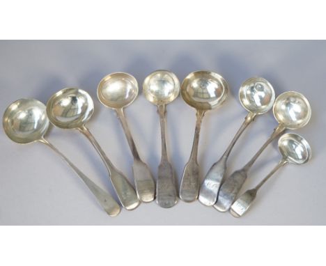 Silver, comprising; a pair of fiddle pattern sauce ladles, London 1822, two further sauce ladels, three Scottish toddy ladles