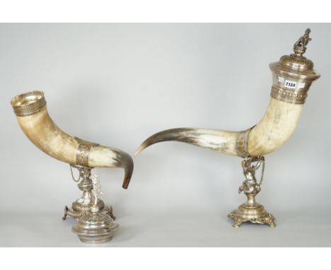 A silver plated metal mounted horn cornucopia, the detachable cover with a finial formed as Mercury and another silver plated