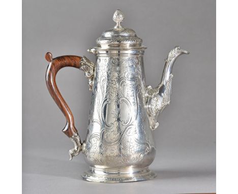 A George II silver coffee pot, of tapered cylindrical form, with later floral, foliate and scroll embossed decoration, the hi