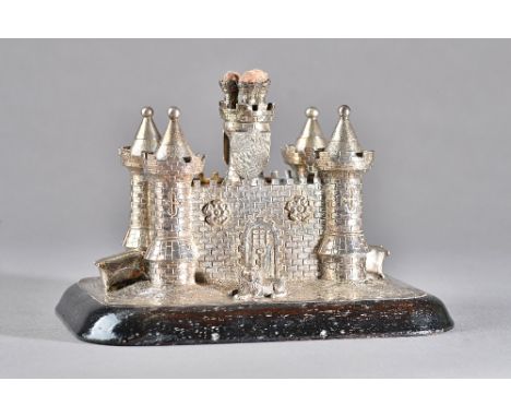 A silver table smoker's compendium, modelled as a representation of Guildford Castle, with a presentation panel detailed, Pre