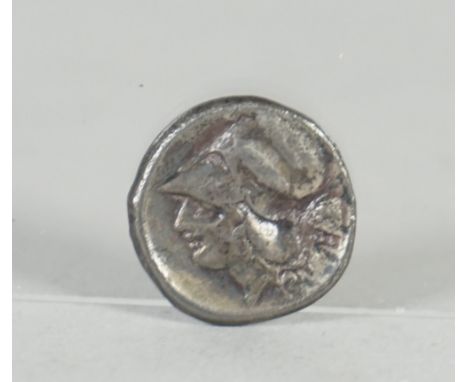 A Corinth Anactorium silver stater, the obverse with the portrait of Athene, the reverse depicting Pegasus, weight 8.2 gms.