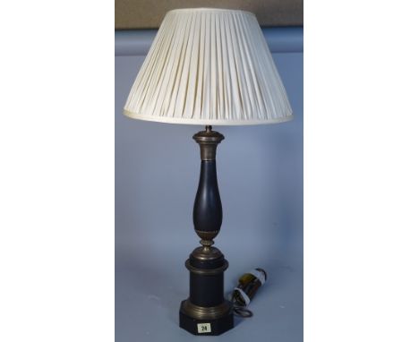 A 20th century gilt metal table lamp of baluster form, on a hexagonal foot, with a cream pleated shade, lamp 50cm high.     