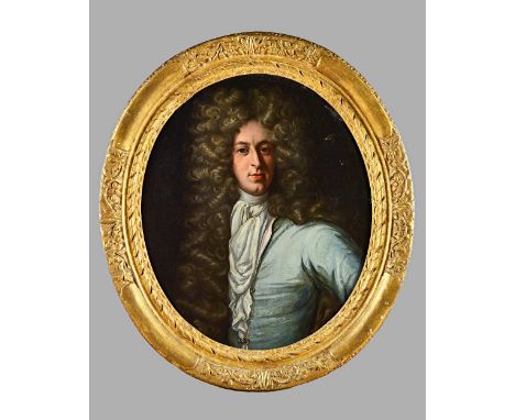 Follower of Sir Godfrey Kneller, Portrait of a gentleman, oil on canvas, oval, 74cm x 62cm.   