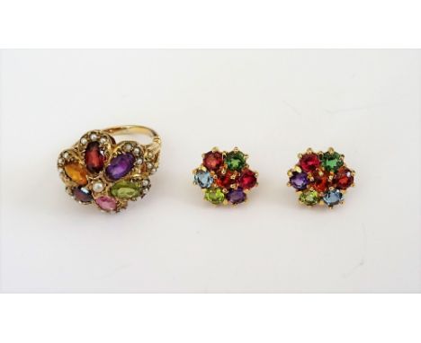 A pair of 18ct gold and varicoloured gemstone set seven stone cluster earstuds, including garnet, amethyst and peridot, the b