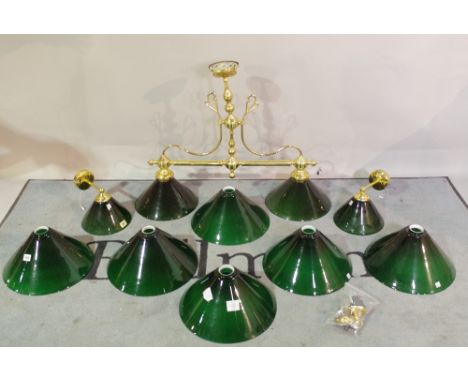 A pair of Christopher Wray gilt metal wall lights with green glass shades, a matching twin branch ceiling light and six furth