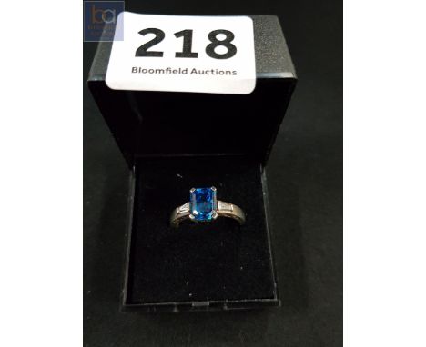 SILVER BLUE TOPAZ AND CRYSTAL RING 