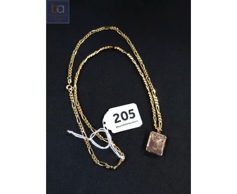 GOLD FRONT AND BACK LOCKET ON YELLOW METAL CHAIN 
