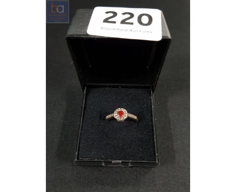SILVER RUBY AND WHITE SAPPHIRE RING 