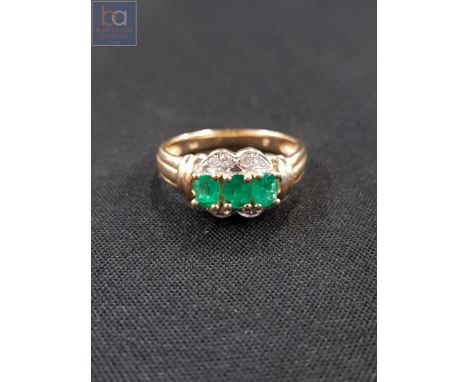 14 CARAT GOLD EMERALD AND DIAMOND RING 