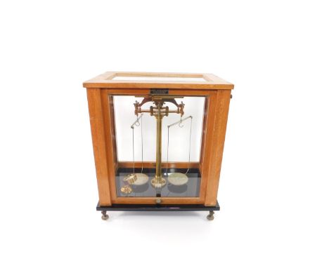 A set of Paul Bunge of Hamburg brass laboratory balance scales, oak cased for Standley Belcher &amp; Mason Ltd Birmingham, ca