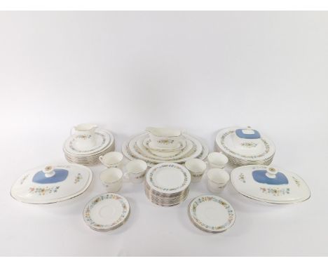 A Royal Doulton porcelain part dinner and tea service, decorated in the Pastorale pattern, comprising two graduated meat plat