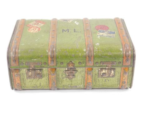 An early 20thC Macfarlane Lang &amp; Company biscuit tin, modelled as a cabin trunk, initialled M L, with faux luggage labels