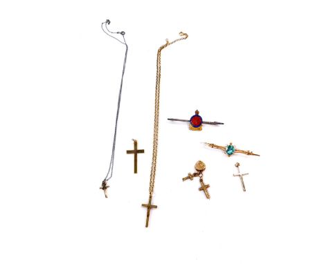 Three 9ct gold crosses, one on a belcher link chain, 10.1g, three cross and heart charms, a bar brooch and a silver and ename