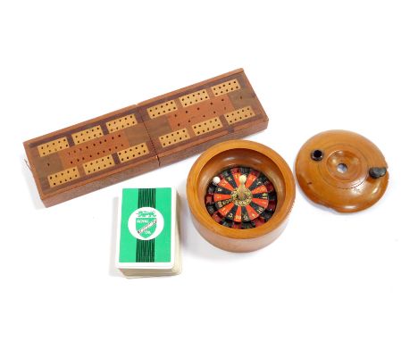 A Victorian sycamore boxed roulette wheel, of circular form, the wheel with a turned bone handle, 11cm Dia, together with a c