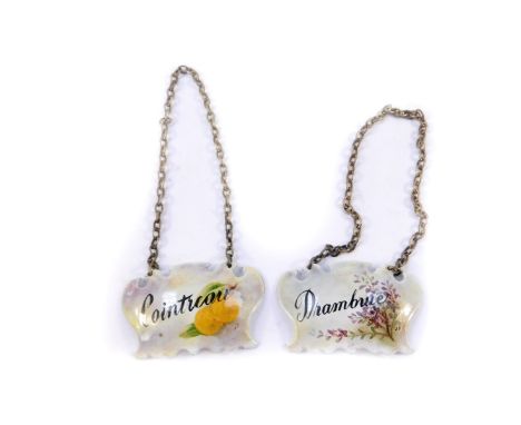 A pair of painted enamel decanter labels, for Drambuie and Cointreau, Graham Payne Studios, Worcester 1983.