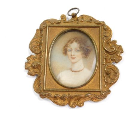 An early 19thC portrait miniature, paper label verso, Louisa, Wife Of Thos. Legh, Adlington, Married Second Thos. Americus Th