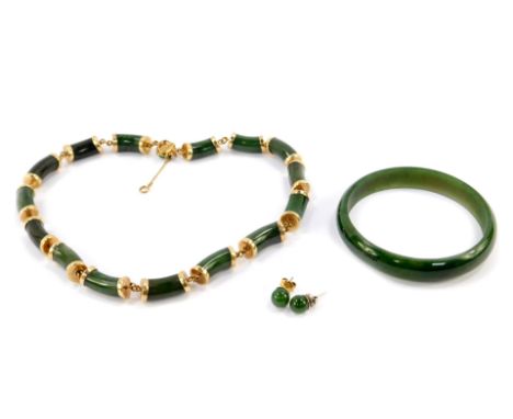 A 14ct gold and jade necklace, of curved barrel formed links, on a cabachon set clasp with safety chain as fitted, a pair of 