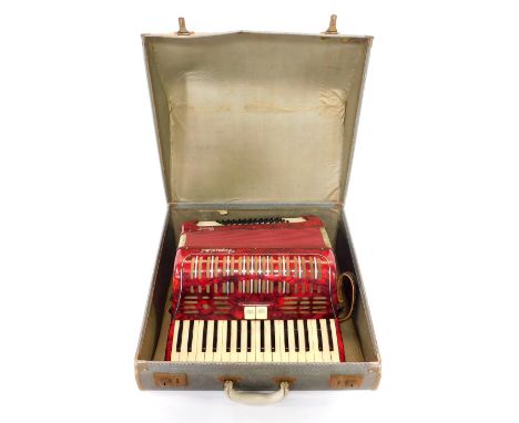 A Soprani Di Silvio Recanatti piano accordian, red cased with cracked ice finish, 48 button.