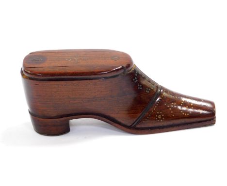 A 19thC rosewood snuff box modelled as a shoe, with brass pin decoration, 10cm L.