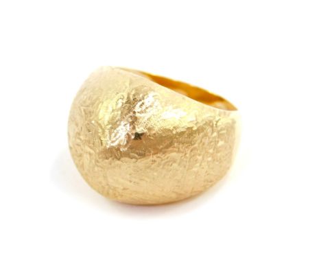 A lady's 14ct gold dress ring, in a domed and textured design, size R, 9.9g.