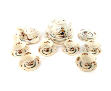A Wedgwood part tea service, decorated in the Chinese Teal pattern, comprising teapot, sucrier, cream jug, bread plate, six t