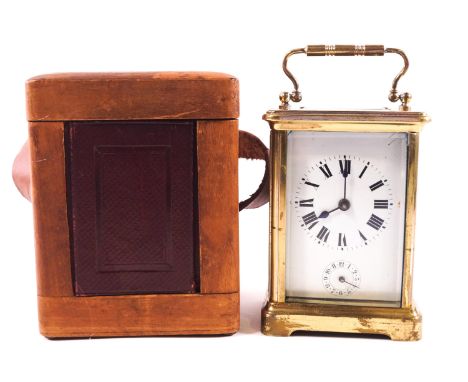 A brass carriage clock alarm clock, of traditional form, in original travelling case, with white Roman dial and subsidiary Ar