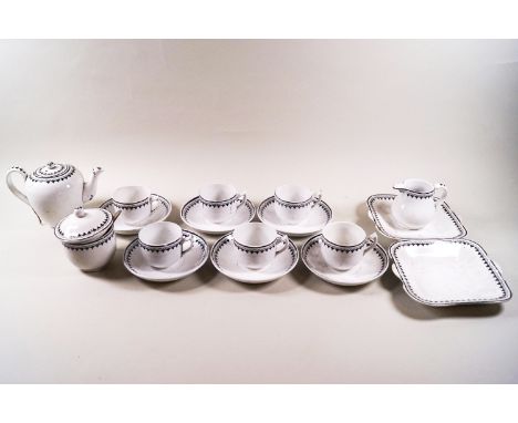 A child's early 19th century Copeland pottery tea service, comprising a tea pot, sucrier and cover together with six cups and