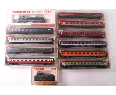 A collection of boxed Fleischmann N Gauge railway models, comprising : 2 locomotives - models 7306 and 9360; and rolling stoc