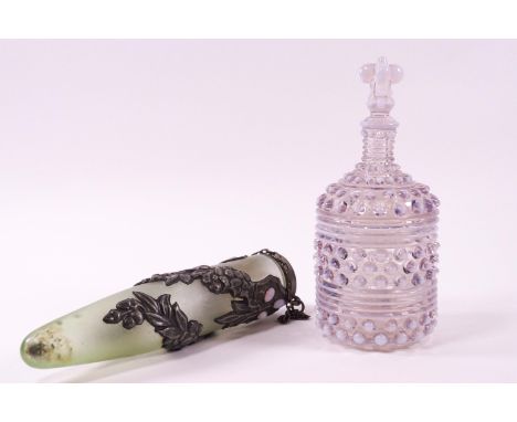 A clear and opaline glass bottle form bowl and cover, the pull off top with a spire style handle topped with a Prince of Wale