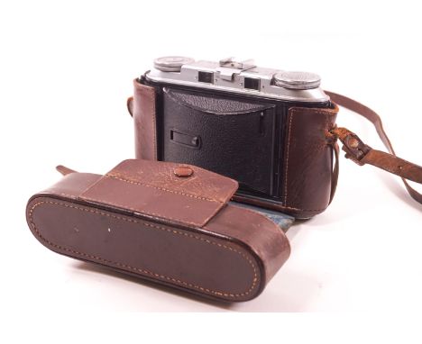 A Voiglander Bessa 11 camera in a leather case, the lens synchro- compur, color-skopar 1:3.5/105