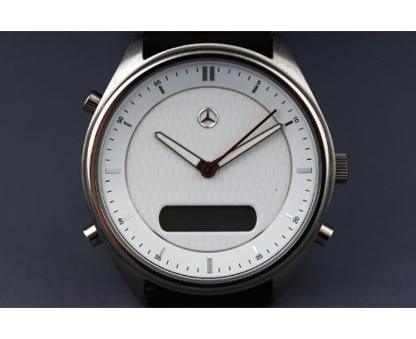 A Mercedes Benz stainless steel Analogue/digital strap watch, quartz movement. Supplied in box with additional red rubber str