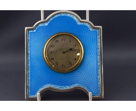 A silver Basse Taille and Guilloche enamel fronted Art Deco style boudoir clock with manual eight day movement, the strut fra