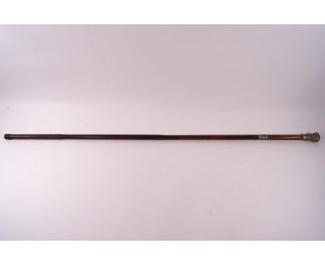 A late 19th century cane sword stick with pressed metal baluster handle