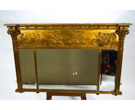 A Regency gilt over mantel three panel mirror of rectangular form, the top set with a frieze decorated with mouldings of Brit