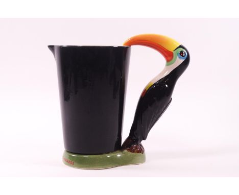 A Carlton ware advertising piece for Guinness, a jug with a toucan handle, 18cm