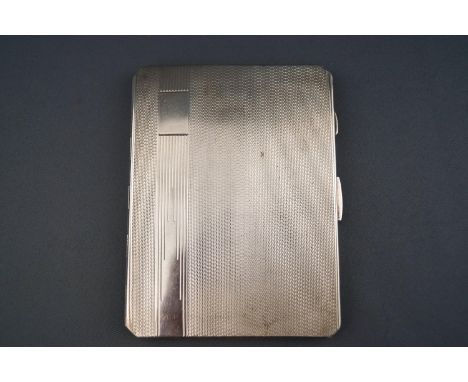 A silver cigarette case, of rectangular form with cut corners, extensively engine turned and an Art Deco style panel, Birming