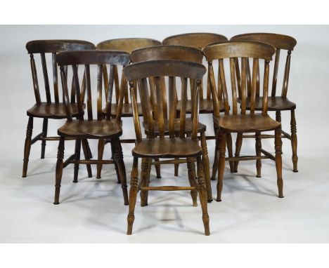 A harlequin set of eight stick back chairs with ash seats on turned legs linked by H stretchers