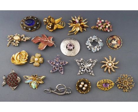 A collection Twenty costume brooches having enamel finish or paste stones. Gross weight, 343 grams