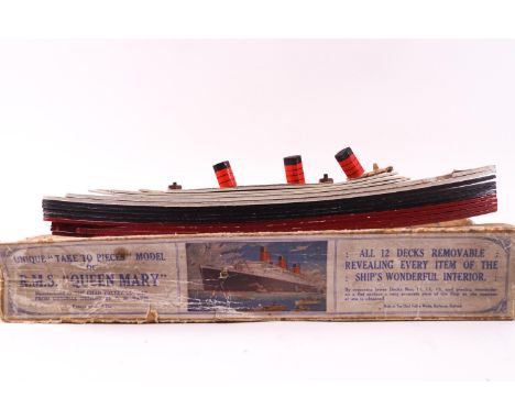 A Chad Valley sectional model of the R M S Queen Mary, showing all twelve decks, in original box, 30cm