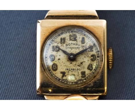 A yellow metal wristwatch by Rotary. 15 jewel mechanical movement. Inner case hallmarked 9ct gold but majority has worn. Fitt