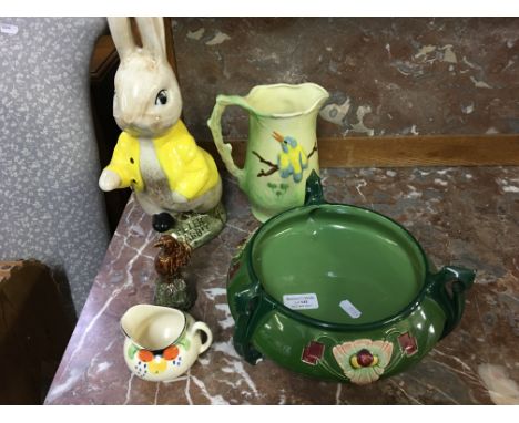 A Sylvac figure of Peter Rabbit, Beswick Beneagles Scotch whisky bottle, Deco style bowl, and two decorative jugs.