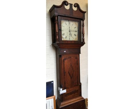 A Sittingbourne Leeds West End oak and mahogany long cased clock.