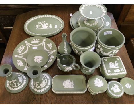A collection of green wedgwood items,candlesticks, trinket, books, plates etc.