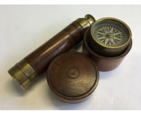 A mahogany and brass three drawer telescope with an R. Alexander compass in fruitwood pot.