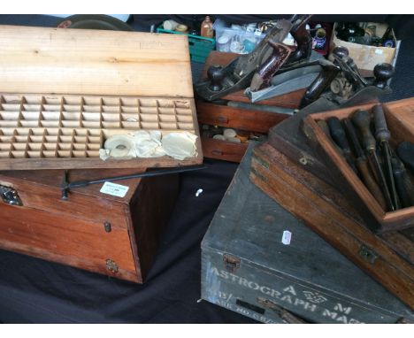 Selection of various tools in various boxes, including engineers watch repair items, tins of screws, hammers, etc.